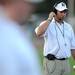 Dexter head coach Brian Baird keeps an eye on the action during the first quarter against Skyline at Dexter on Friday night.